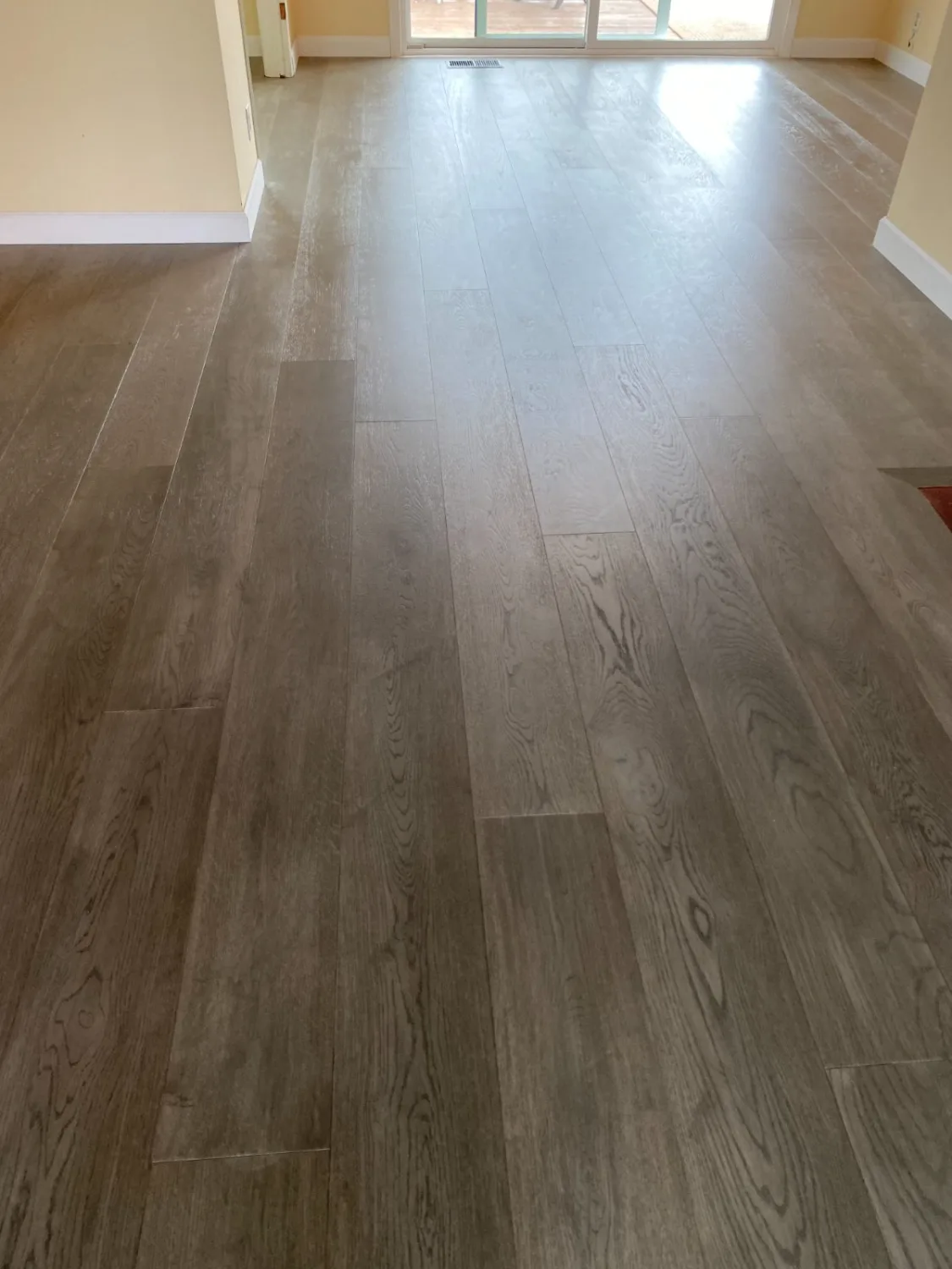 Grey-toned oak hardwood flooring in a living room