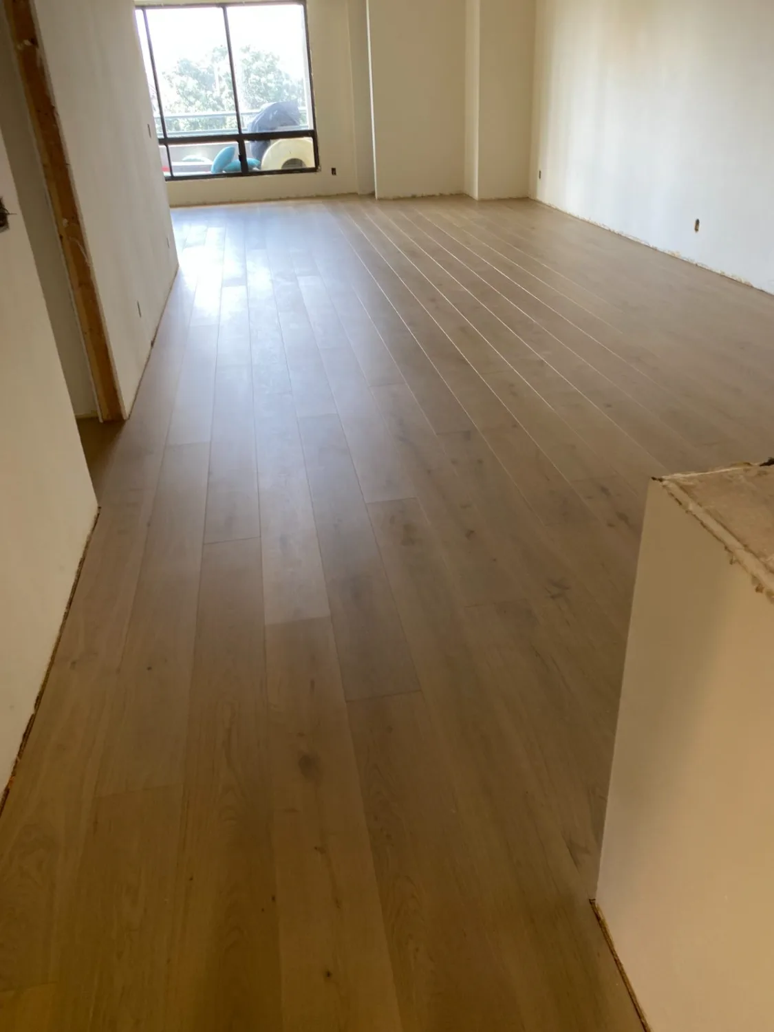 Light oak hardwood flooring in a bedroom