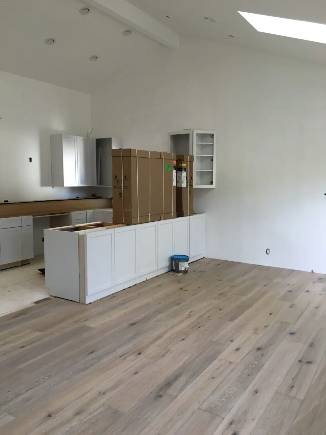 Light oak hardwood flooring in a kitchen