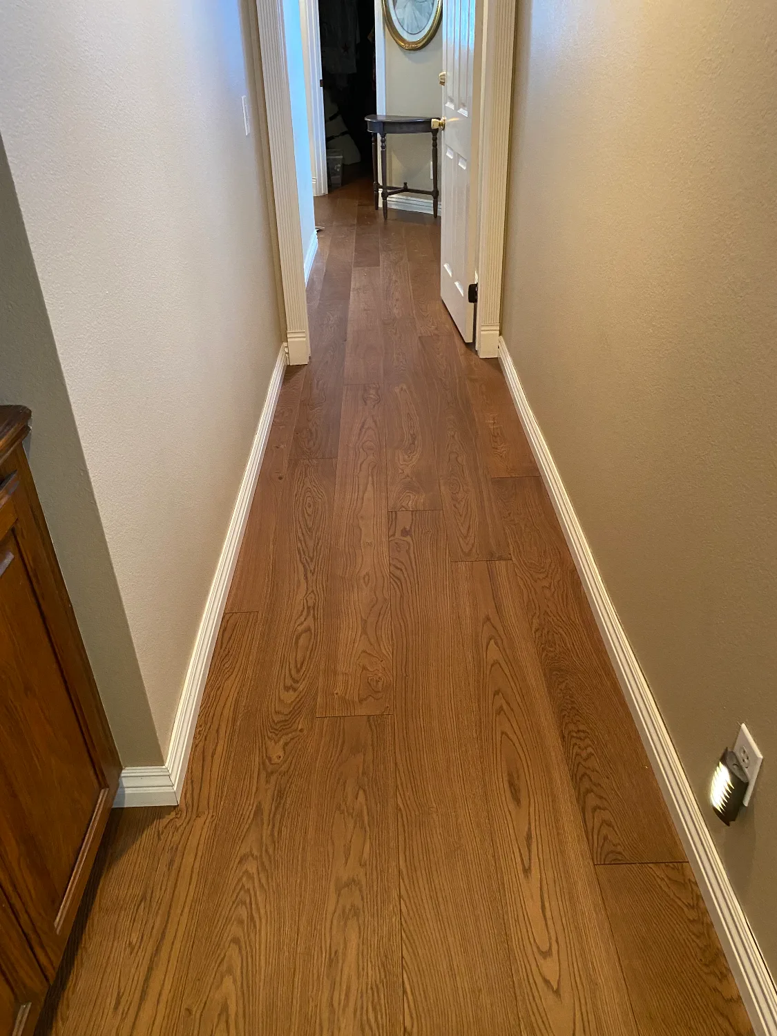 Panaget Diva 184 Cuir French oak hardwood flooring installed in a hallway