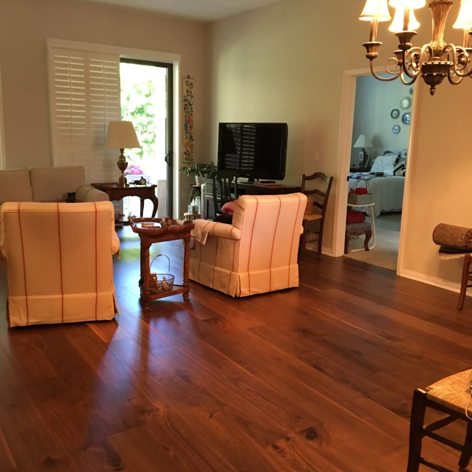 Walnut-toned hardwood flooring in a furnished living room