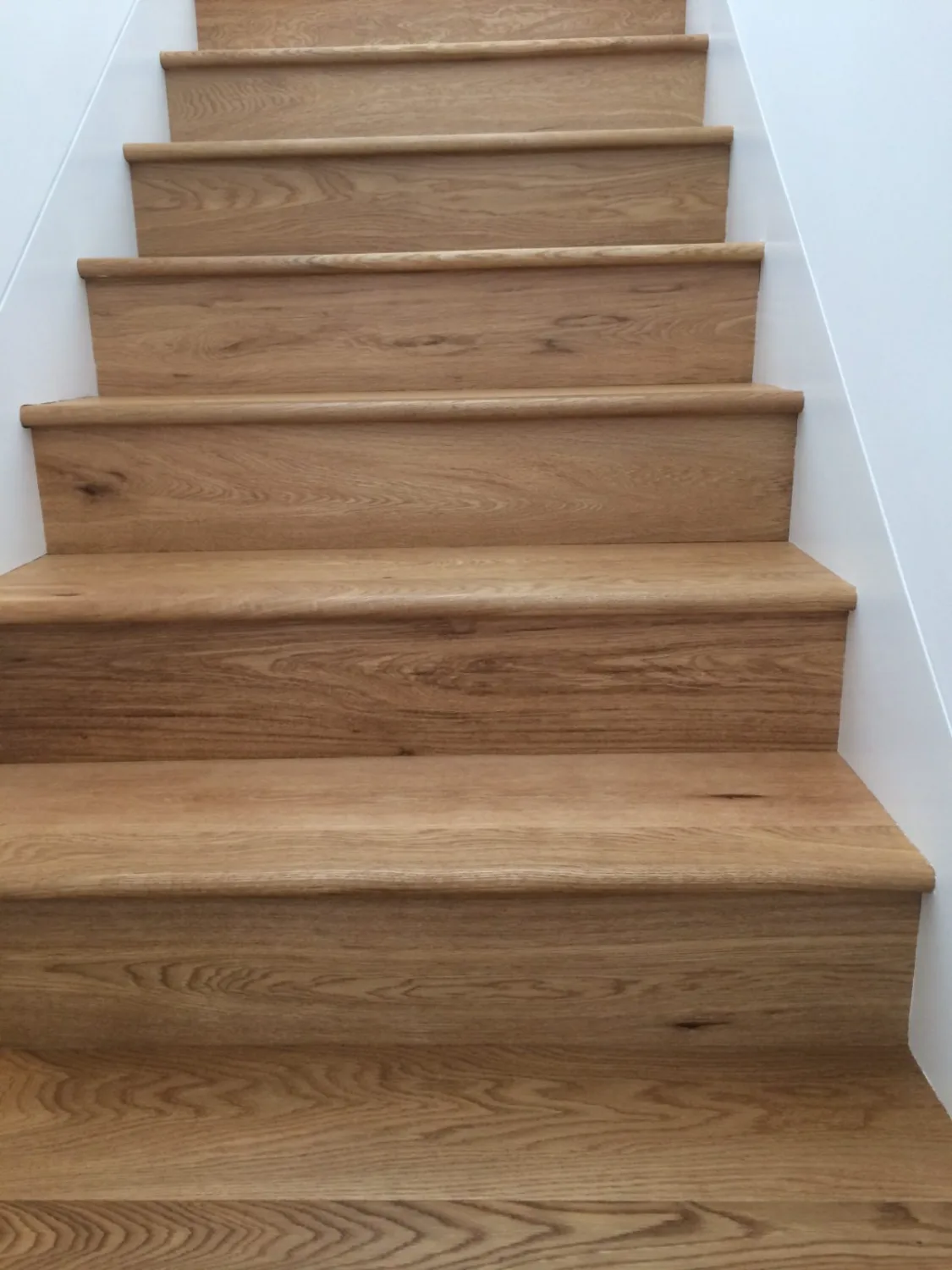 Natural oak stair treads with white risers