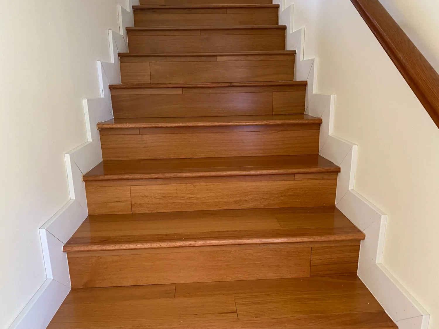 Oak hardwood stair treads and risers in a straight flight