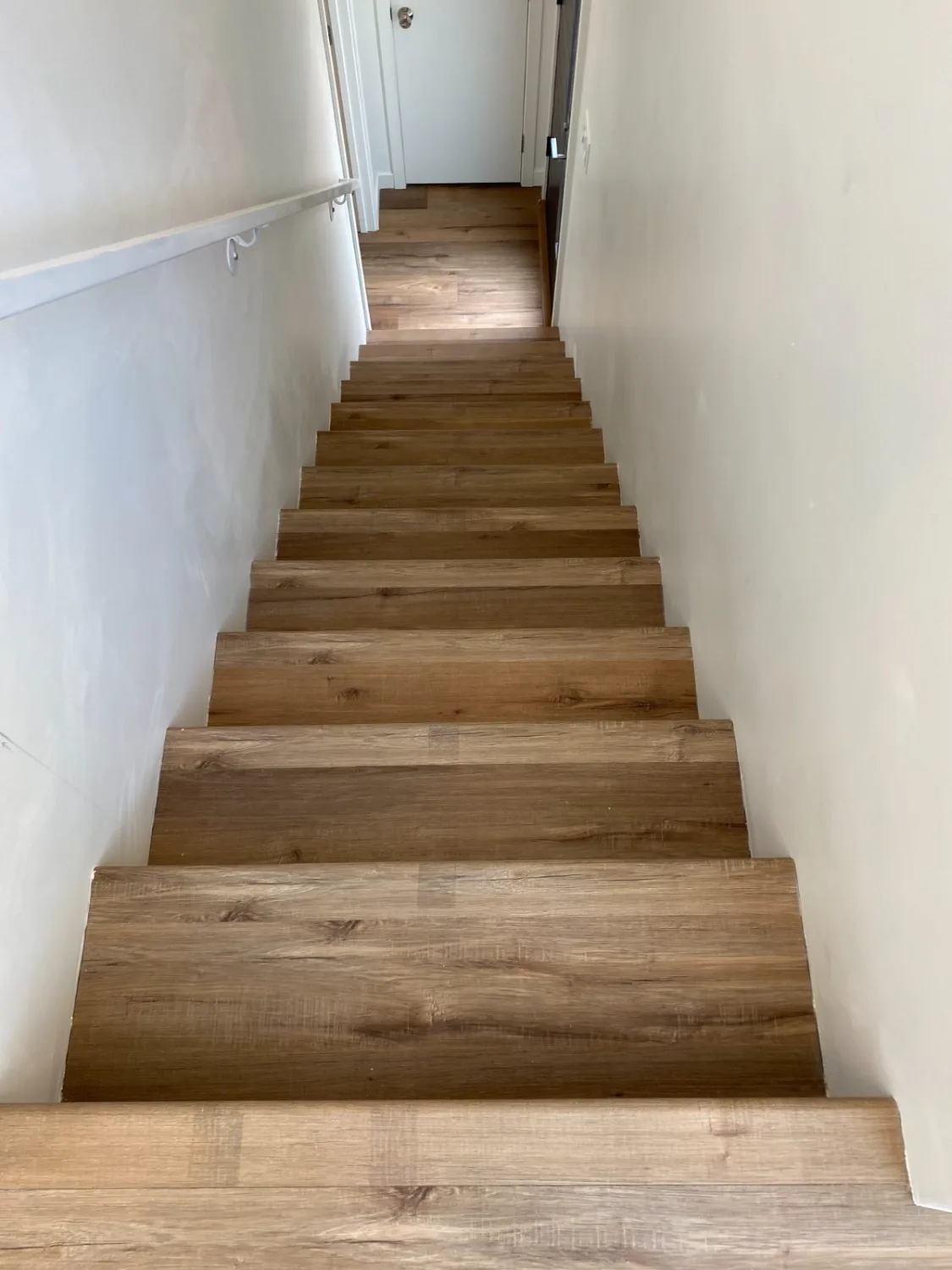 Oak hardwood stair treads in a straight flight