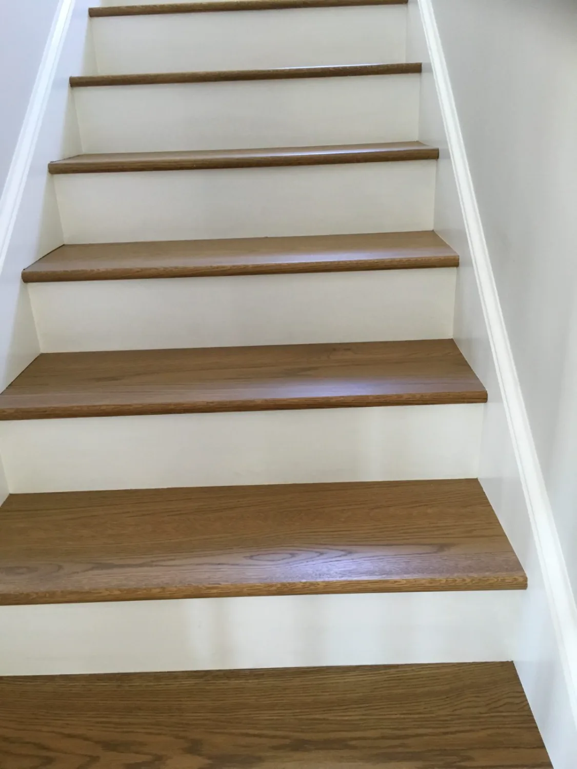 Oak hardwood stair treads with white risers