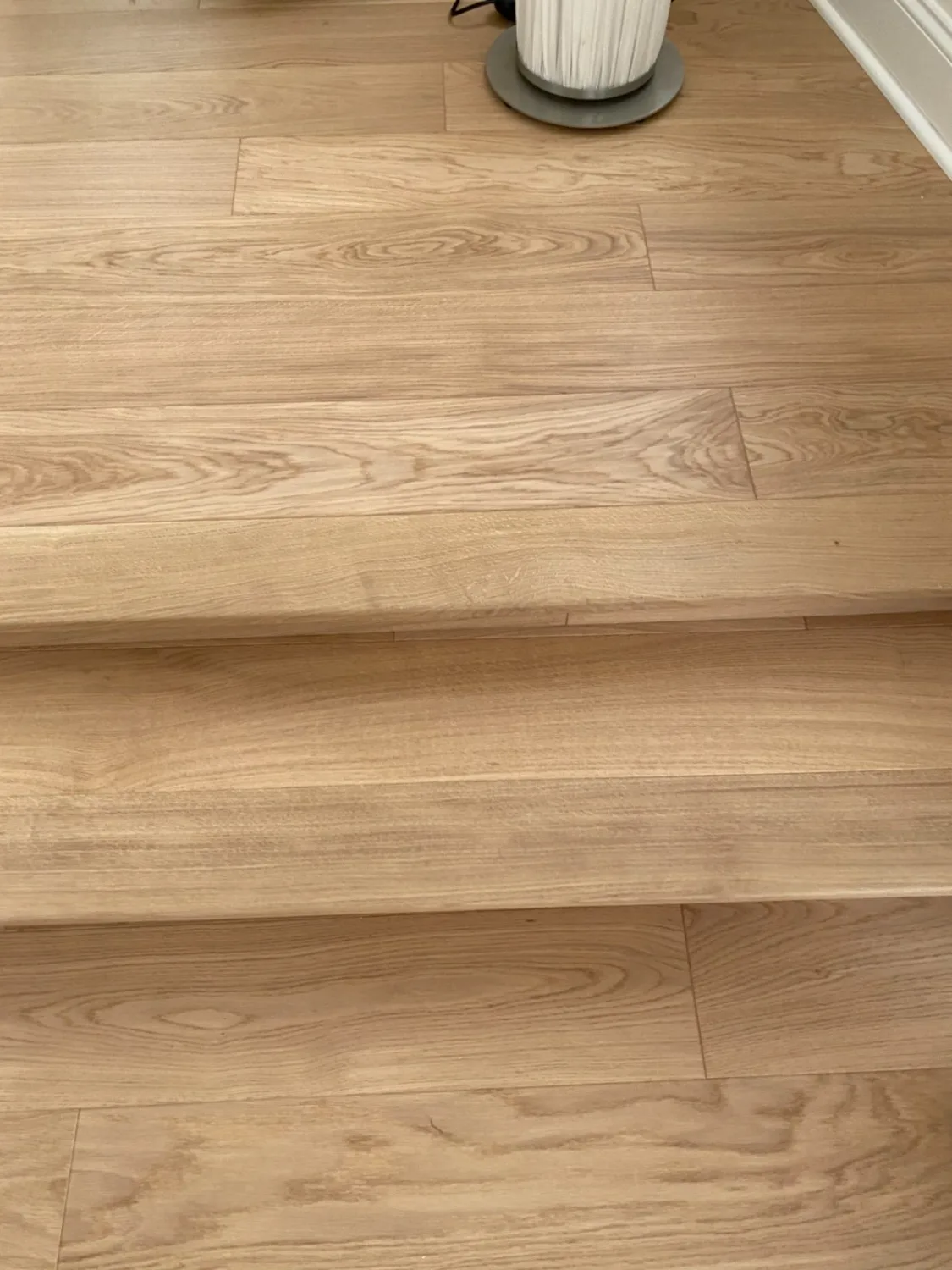 Close-up of a white oak hardwood stair tread