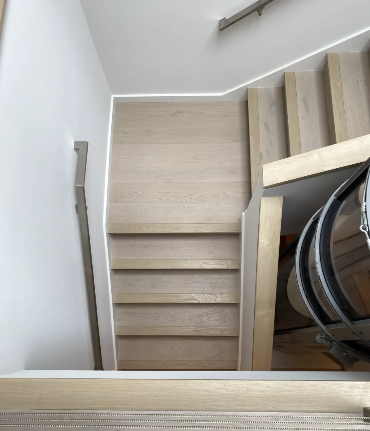 Staircase · White Oak hardwood flooring by EKO FLOORING