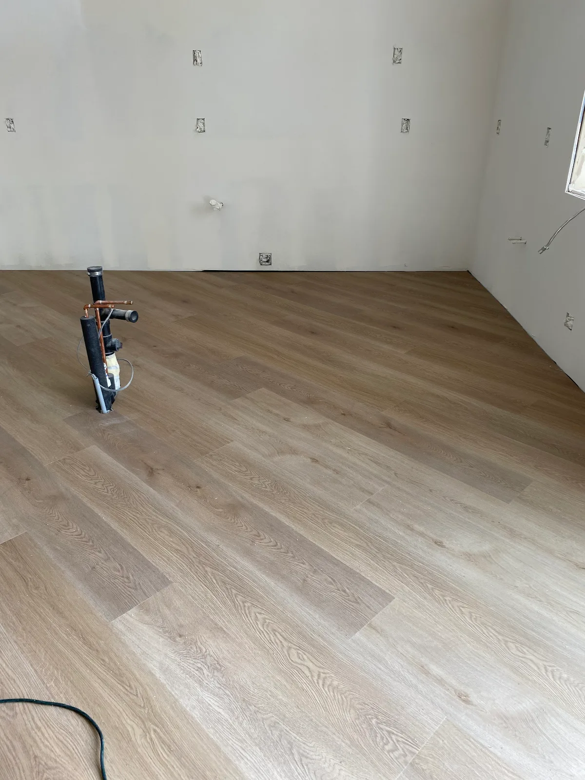 Gaia Athena SPC vinyl plank flooring in a Pacific Palisades home