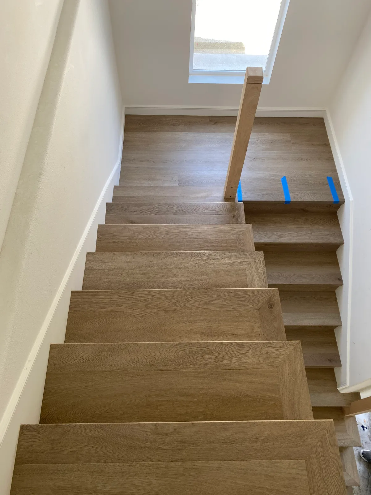Gaia Athena SPC vinyl plank staircase with matching treads and risers