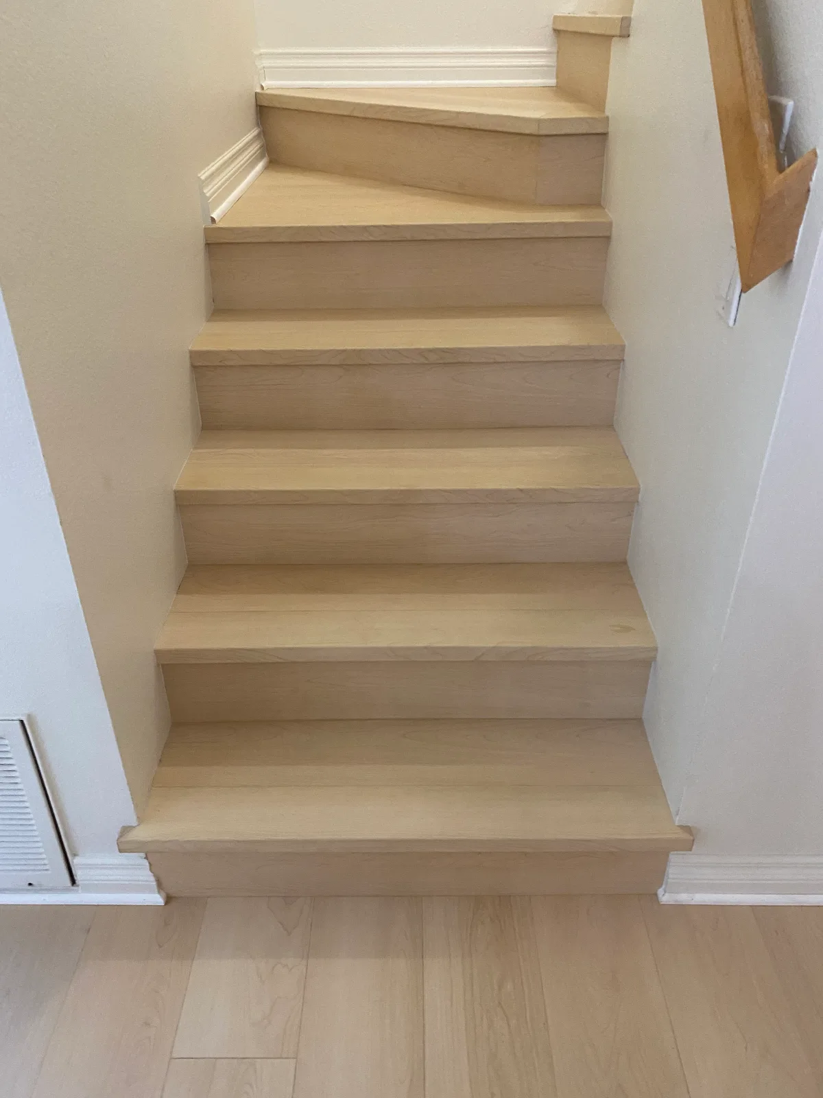 Nearwood Natura maple laminate stairs seen from the landing above