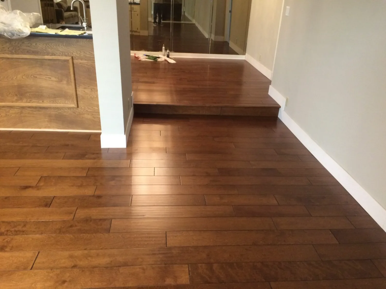 Laminate wood flooring in an open living room